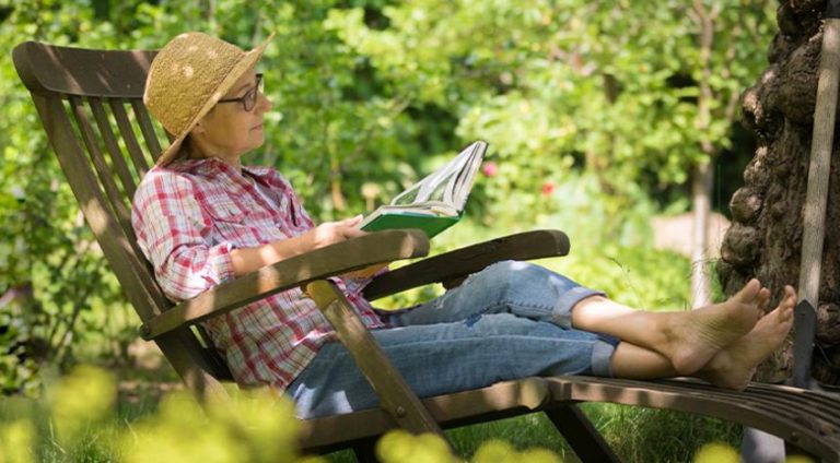 A woman reading outside