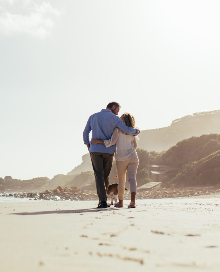 A couple walking on a beach