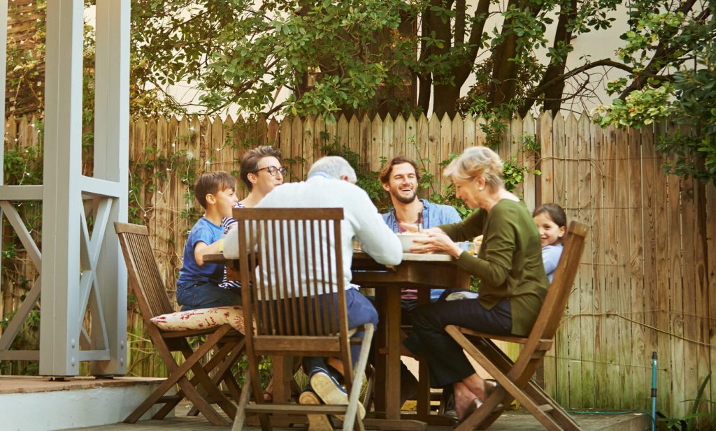 A family dining outside