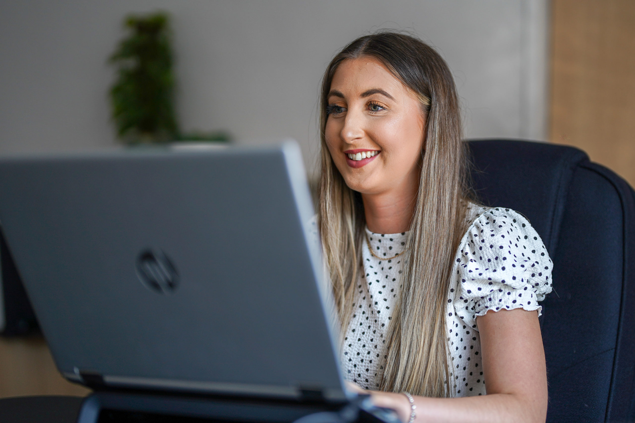 A woman using a laptop